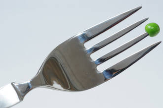 Fourchette avec un petit-pois