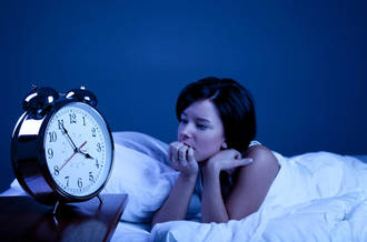 Une femme qui a une insomnie